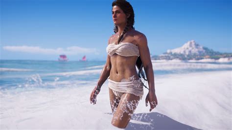 A Woman Walking On The Beach In Her Bathing Suit With White Paint All