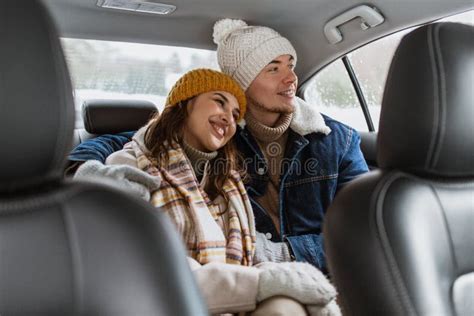 Happy Smiling Couple On Car Back Seat In Winter Stock Photo Image Of