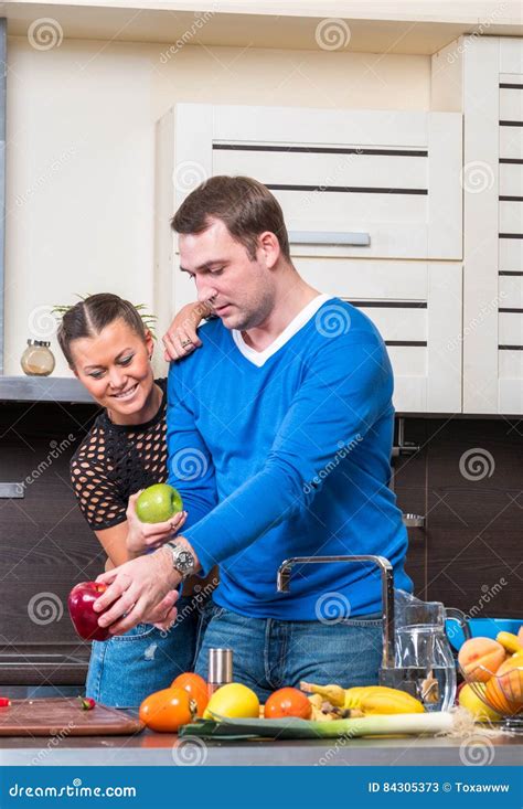 Young Couple Having Fun In The Kitchen Stock Image Image Of Cook