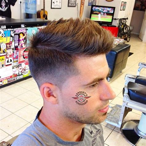To create this kind of haircut the hair on the sides and back first is clipped in layers and the second is smoothed that gives a gradual reduction in hair length. 1/2 fade heavily textured Ivy League | Men's Hair | Pinterest