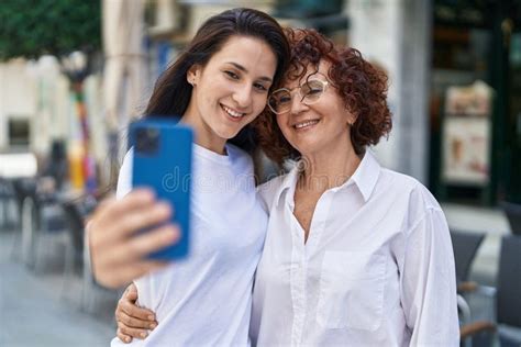 Two Women Mother And Daughter Making Selfie By Smartphone At Street Stock Image Image Of Smile