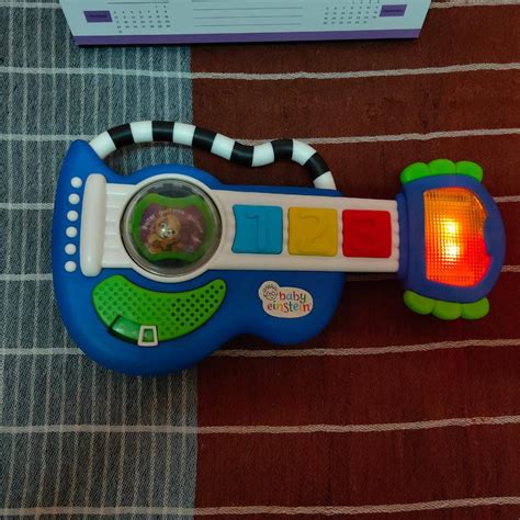 Baby Einstein Rock Light And Roll Guitar Learning Music Lights Up