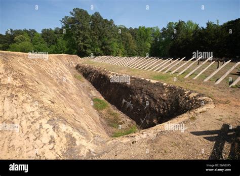 Trench Ditch With Sharpened Inclined Log Fraise Defense At The