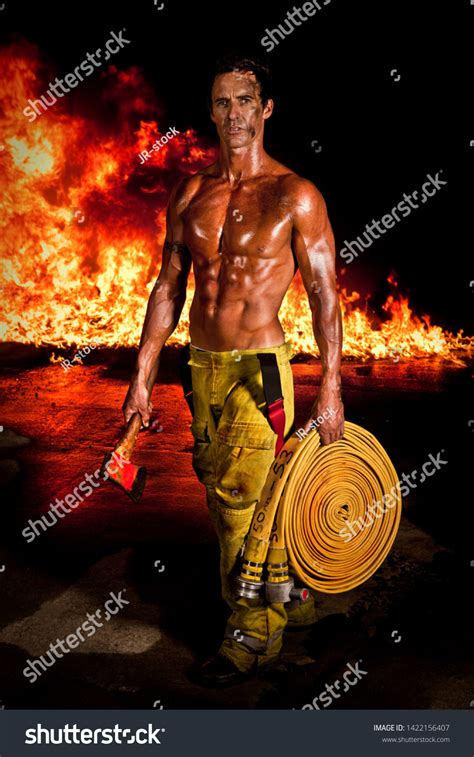 Rugged Muscular Firefighter Axe Firehose Hands Stock Photo Shutterstock