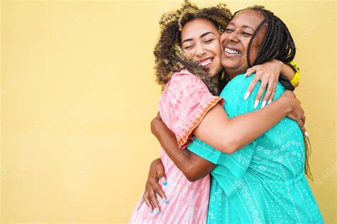 Premium Photo Happy Mother And Daughter Hugging Each Others With