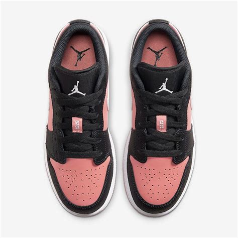 The upper is made of various suedes and leathers, matched with a hodgepodge of black, baroque brown, and racer pink. 'Pink Quartz' Reaches the Air Jordan 1 Low - Sneaker Freaker