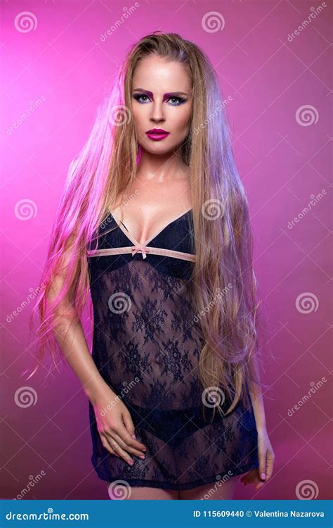 Blonde Girl On Pink Background In Blue Dress Stock Photo Image Of