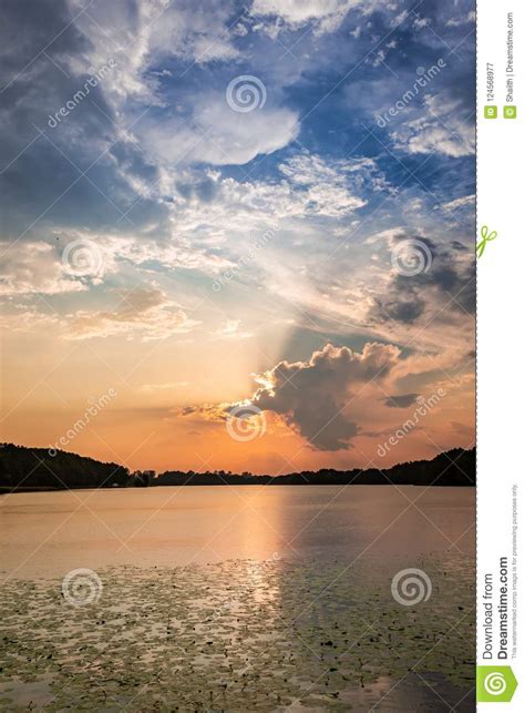 Calm Sunset At The Summer Lake With Dynamic Clouds Stock Image Image