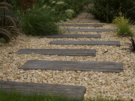 A stepping stone and pathway combo is that unique design it is created by several materials just like a mix of gravel and river rocks with concrete stepping stones. Log Sleeper 900 x 225 x 40 | Garden stepping stones ...
