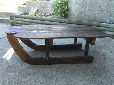 Add style to your home, with pieces that add to your decor while providing hidden storage. Sleigh coffee table I made. | Coffee table, Table, Pallet ...