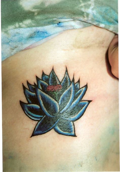 Lotus flowers are perfect for a large, detailed design. 1990Tattoos: Black Lotus Tattoo