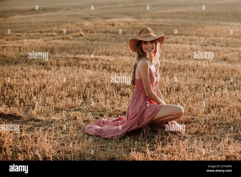 Woman In Dress Kneeling On Hi Res Stock Photography And Images Alamy