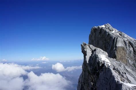 Jade dragon snow mountain is a mountain massif (also identified as a small mountain range) near lijiang, in yunnan province, southwestern china. Southwest China - Sichuan, Tibet & Yunnan (19 - Around ...