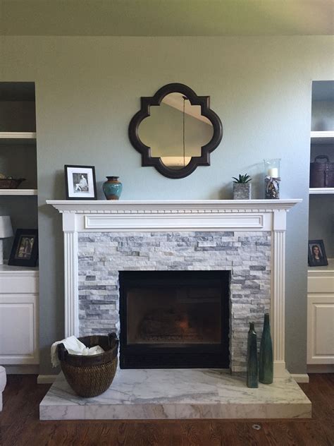 Check spelling or type a new query. Refaced fireplace Face: MSI Alaska Grey Stone Ledger Panels Hearth: Floor & Decor Ocean White ...