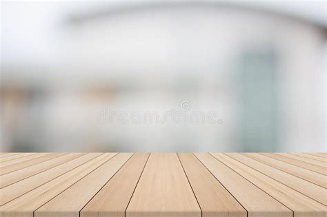 Empty Wood Table Top On White Blurred Background From