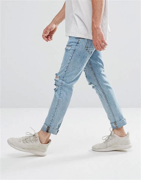 Bershka Denim Skinny Jeans With Extreme Rips In Light Wash In Blue For