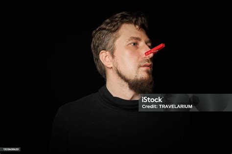 Bearded Prankster With Clothespin On Nose Funny Joke Concept Stock