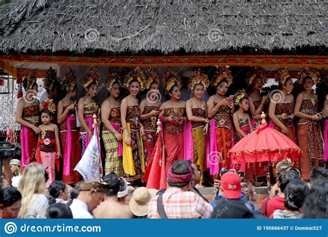 Local Girls With Ornate Gold Head Dresses In The Village Of Tenganan Bali During The Annual