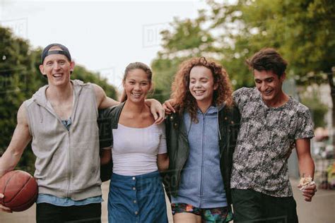 Portrait Of Multiracial Group Of People Enjoying A Walk Outdoors Four