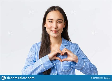 Close Up Of Lovely Feminine Asian Girl In Blue Pajama Express Love And