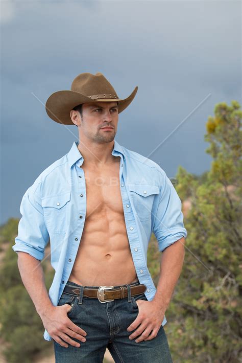 Sexy Muscular Cowboy Outdoors In An Open Shirt Rob Lang Images