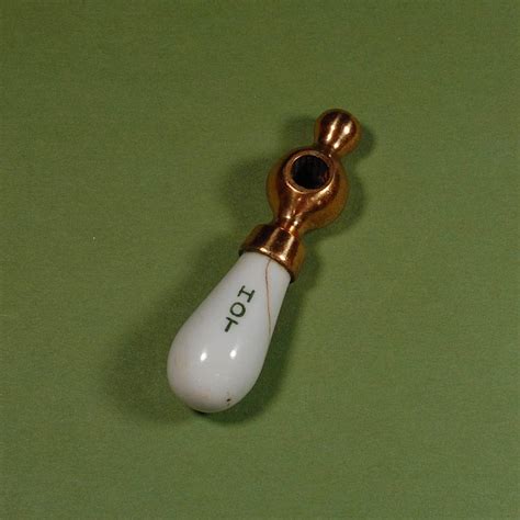 Pobierz to zdjęcie vintage water faucet isolated teraz. Vintage/Antique Brass and Porcelain Hot Water Faucet ...