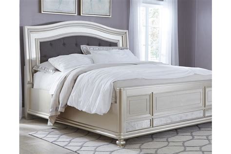 Generously scaled headboard with crystalline buttons will have you feeling sheltered in comfort and luxury. Coralayne Queen Panel Bed | Queen upholstered bed, King ...