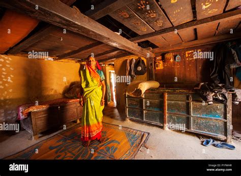Indian Woman At His Kumaoni House At The Remote Kundal Village On The Nandhour Valley Kumaon