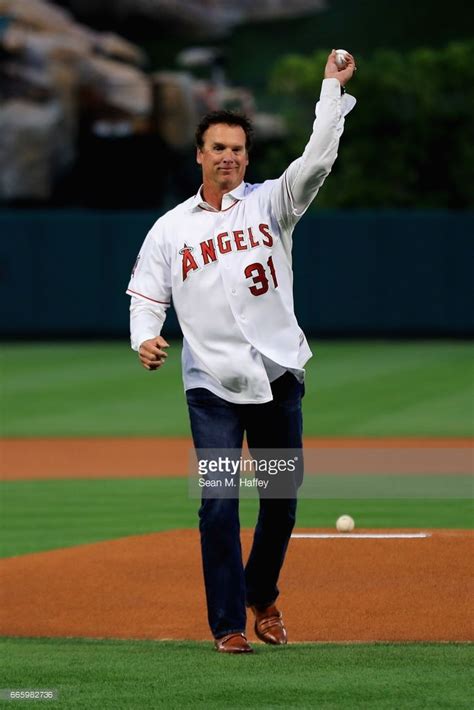 The Los Angeles Angels Baseball Teams First Baseman Throws Out A Ball