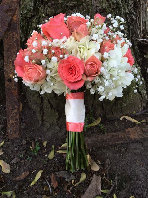 Bridal Bouquet Of Coral Roses Hydrangea And Babies Breath