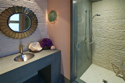 A Relaxing Green And Peach Color Scheme Gives This Coastal Bathroom A