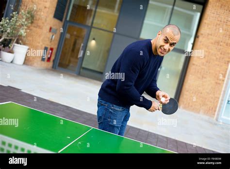 Young Man Playing Ping Pong Stock Photo Alamy