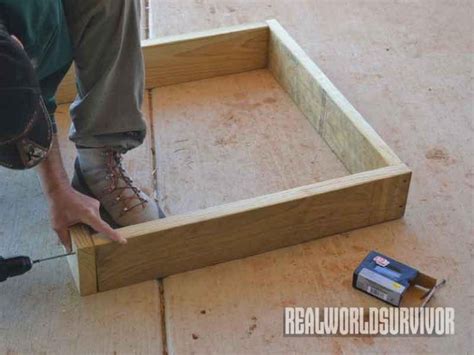 Repeat to attach the remaining base board to the back wall. DIY: How to Build A Sturdy, Three Tiered, Raised Garden ...