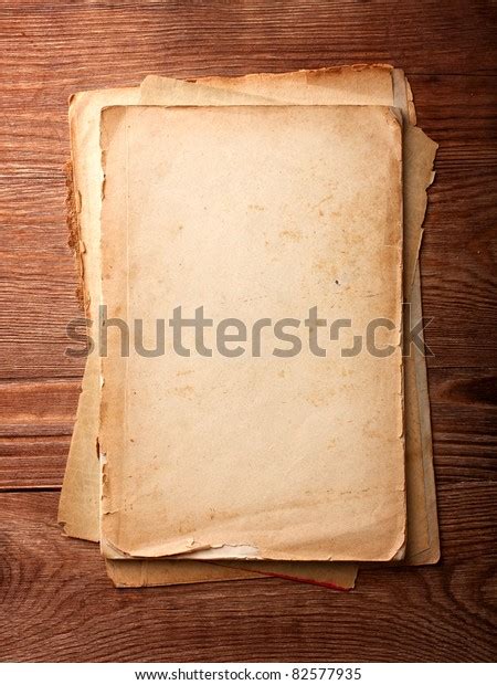 Stack Old Papers On Wooden Table Stock Photo Edit Now 82577935