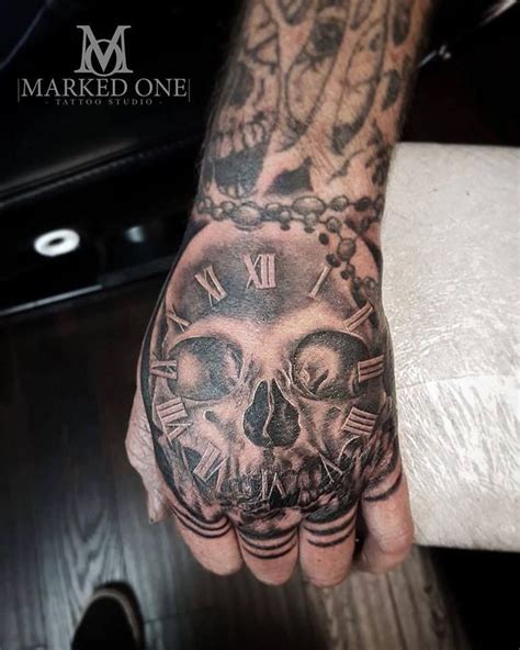 You just have to find the best design that will surely fit your physical appearance. Masculine hand tattoo by Gav Guest. Skull and clock tattoo ...