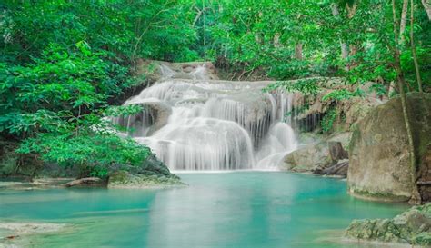 Premium Photo Waterfall In Autumn Forest At Erawan Waterfall National