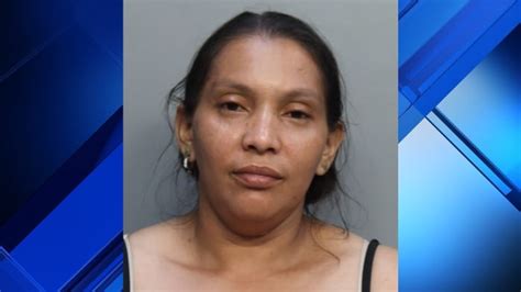 Police Miami Woman Arrested After Punching Daughter Kicking Cop