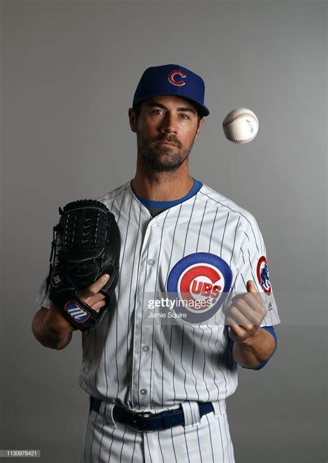 The Chicago Cubs Baseball Player Poses For A Photo In His Uniform And
