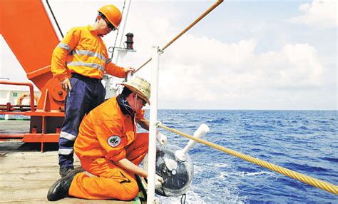 Researchers Aboard The Zhang Qian Place A Buoy For A