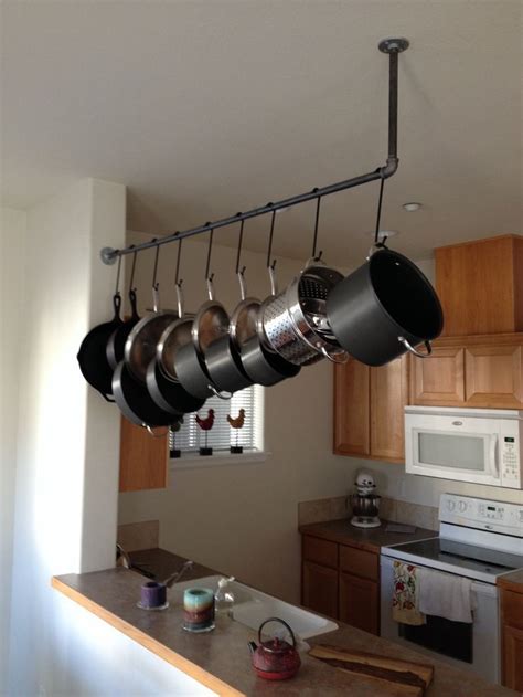 The hanging pots and pans racks might not be everyone's cup of tea because of the limitation of ceiling space. 52 best rack for pots and pans images on Pinterest ...