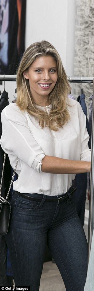 Natasha Oakley Covers Up In Blouse And Jeans As She Donates Designer