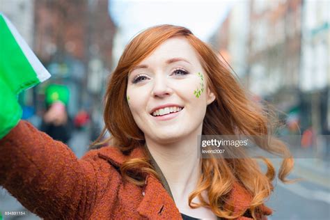 Red Haired Irish Girl At St Patricks Day Parade High Res