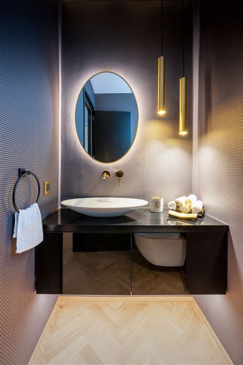 A Dark Moody Powder Room Is All We Need Round Mirror Bathroom Modern