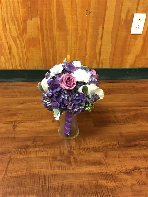 A Mostly Purple Bouquet Purple And White Hydrangea White Carnations