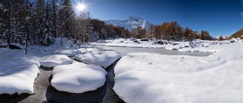 Snowy Mountain In The French Alps Blue Sky With Sun Stock Image