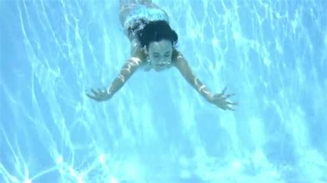 Girl In Bikini Swimming Underwater In Blue Pool Cinematic Slow Motion Video — Stock Video