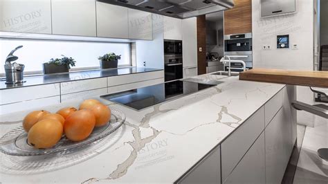 Contrast or complement textures, tones and more by using a mix of materials for countertops and island tops. Calacatta Gold Quartz Countertop, White Kitchen Quartz ...