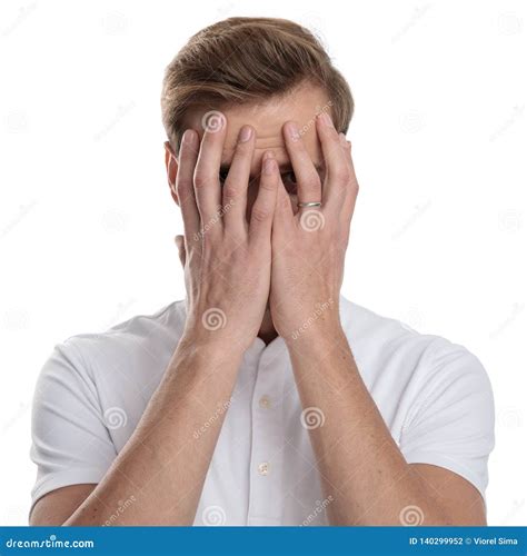 Man Covering His Face With His Palms Stock Photo Image Of Shirt Casual