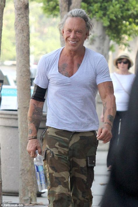 Mickey Rourke 62 Is Lean And Mean In Camouflage As He Shows Off A Gleaming Smile Daily Mail