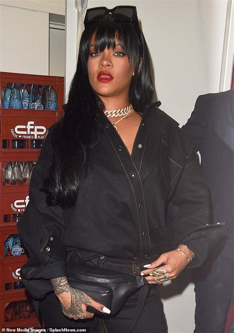 Rihanna Flaunts All Black Denim Pieces From Her New Fenty Line